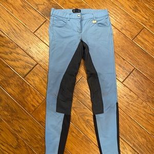 B. Vertigo light blue full seat breeches with dark blue seat.